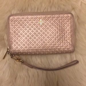 Tory Burch wristlet golden pink color.